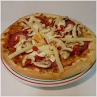 Tomaat, kaas, asperges, ham, champignons en oregano